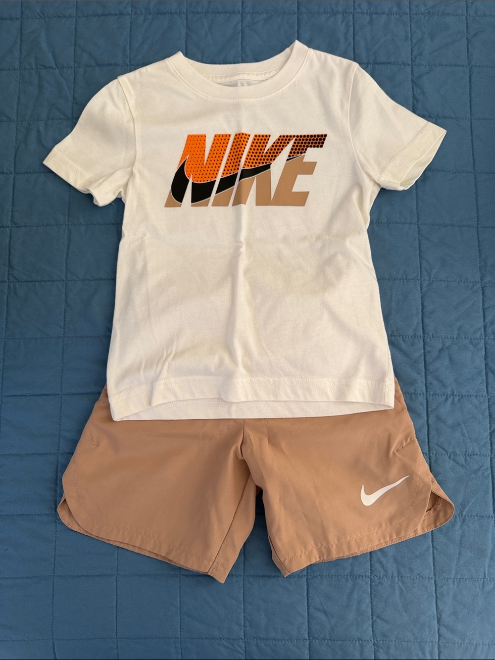 Nike White Tee with Orange & Tan Logo and Tan Athletic Shorts